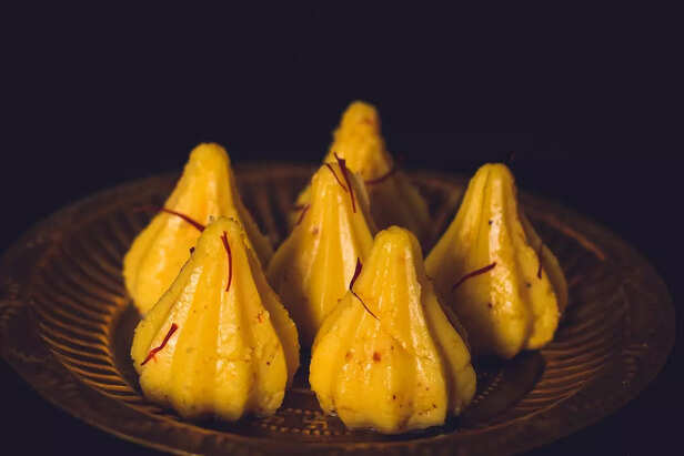 A Child Receiving Prasad