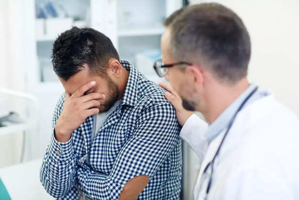 Doctor Facing Angry Patient Family