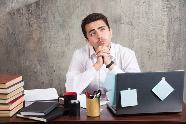 Person Confused at Desk