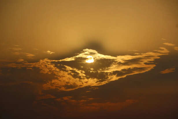 Golden Light Through Clouds