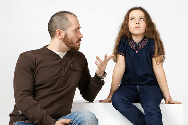 Parents scolding kids
