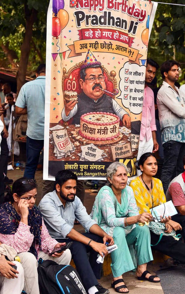 People take part in a protest by Cockroach Janata Party...