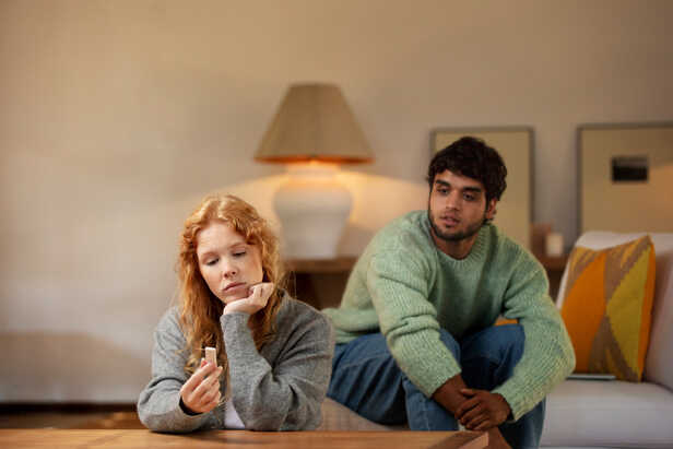 Person Sitting Alone Deep in Thought