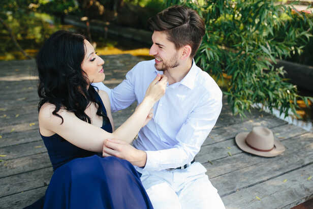 Two People Talking and Smiling