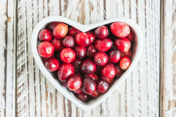 Fresh Cranberries in a Wooden Bowl