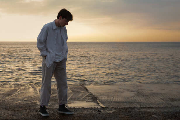 A Person Standing Alone During Difficult Times