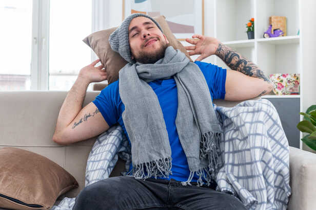 Person Resting While Recovering From Illness