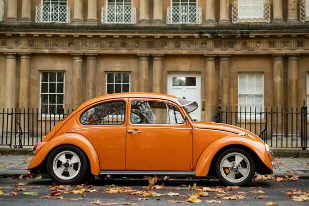 Classic Volkswagen Beetle and Mercedes-Benz S-Class