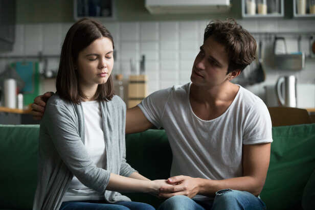 Couple Sitting Together Without Talking