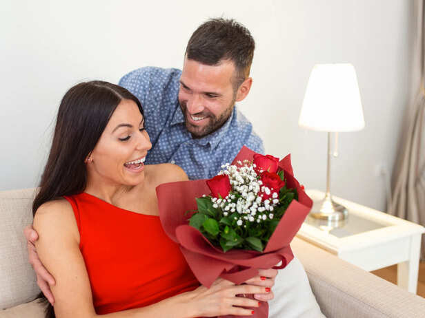 Couple giving flower