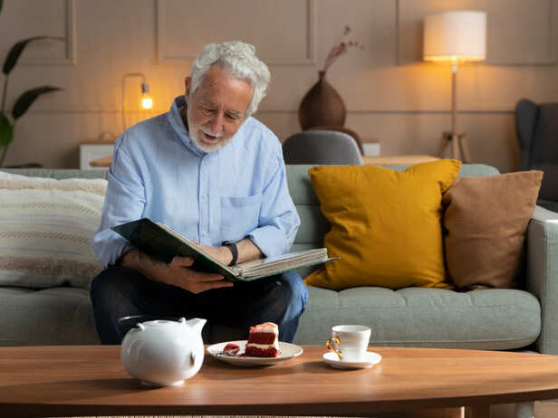 Elderly person sitting quietly at home