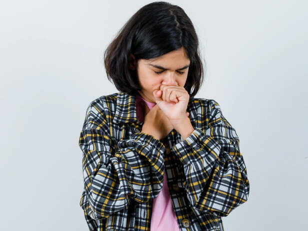 Woman Experiencing a Sore Throat