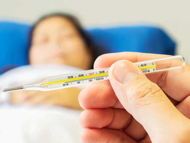 Checking Body Temperature During Fever