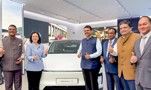 Mumbai, Jul 15 (ANI): Maharashtra Chief Minister Devendra Fadnavis and Tesla Sen...