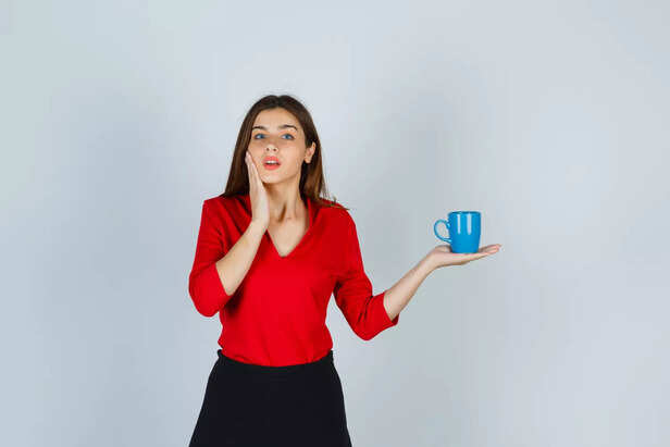 Woman with her coffee nea