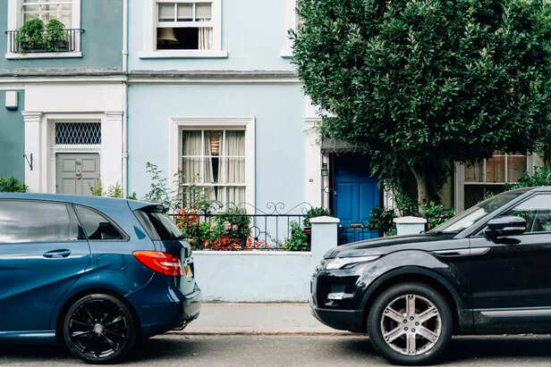 An urban street at morning with cars