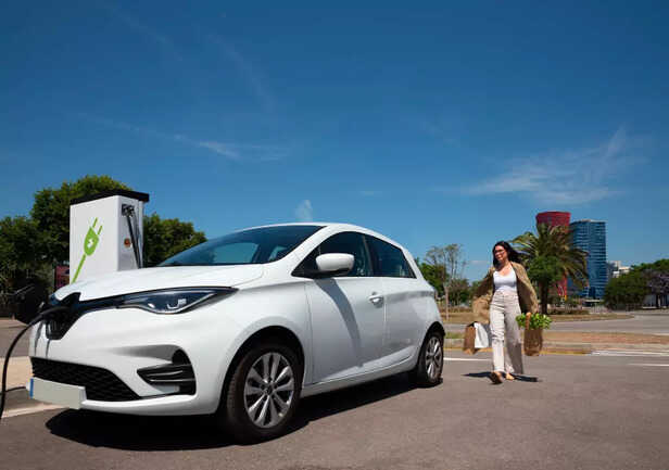 A Tiago EV parked outside