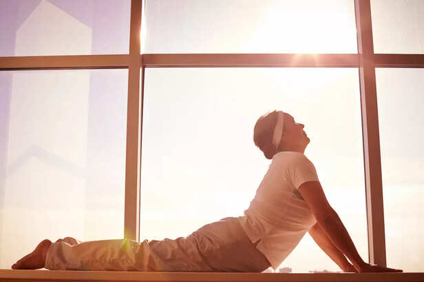 A woman doing light yoga