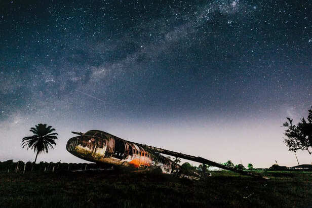 Plane with a caution symb