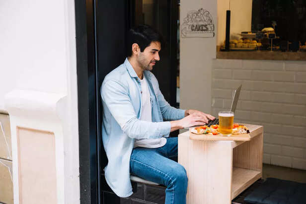 A Man working at a digita